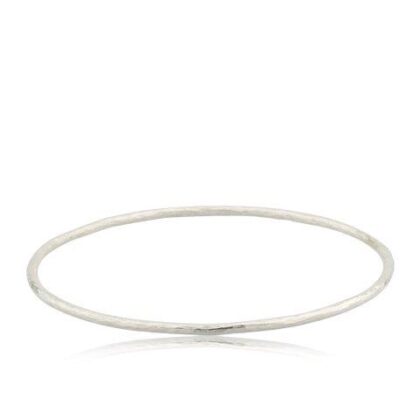 Dainty solid silver bangle with hammered finish