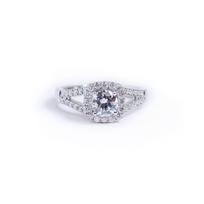 Beautiful Halo Style Mounting with Side Diamonds and CZ Center
