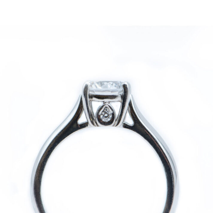 Platinum Ring with CZ Center and 2 Side Diamonds