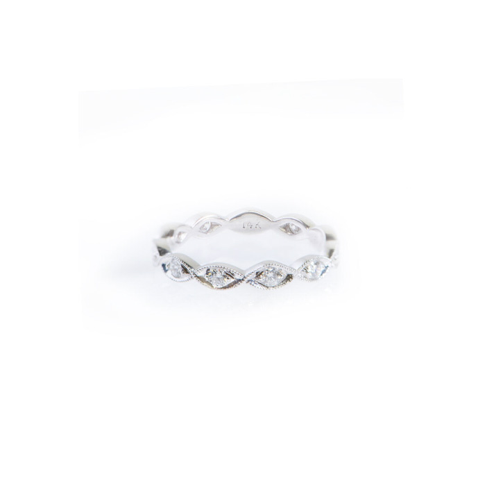 White Gold Ring Featuring Round Diamonds Set in Marquise Shapes
